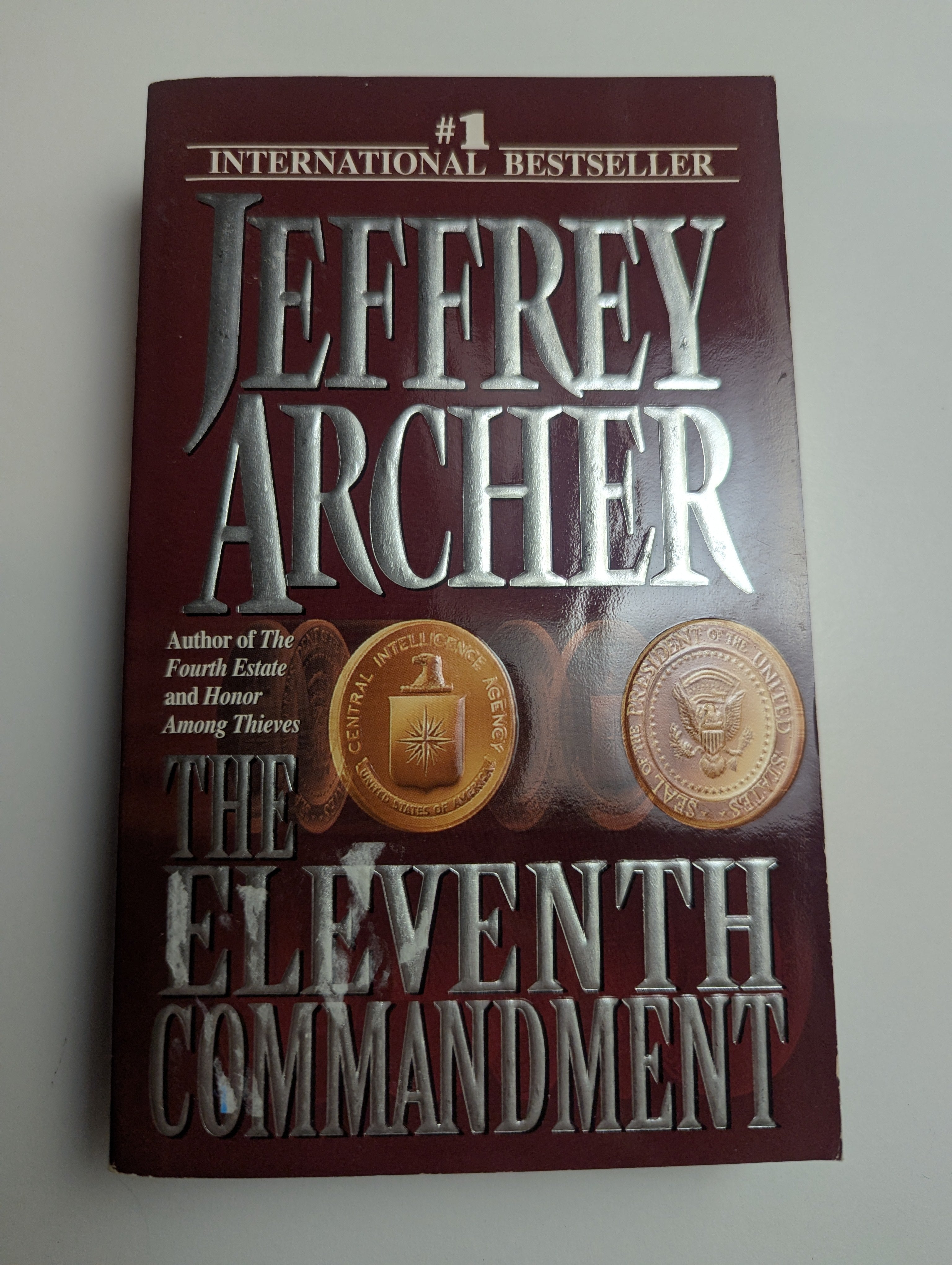 The Eleventh Commandment — by Jeffrey Archer - Lightly Used