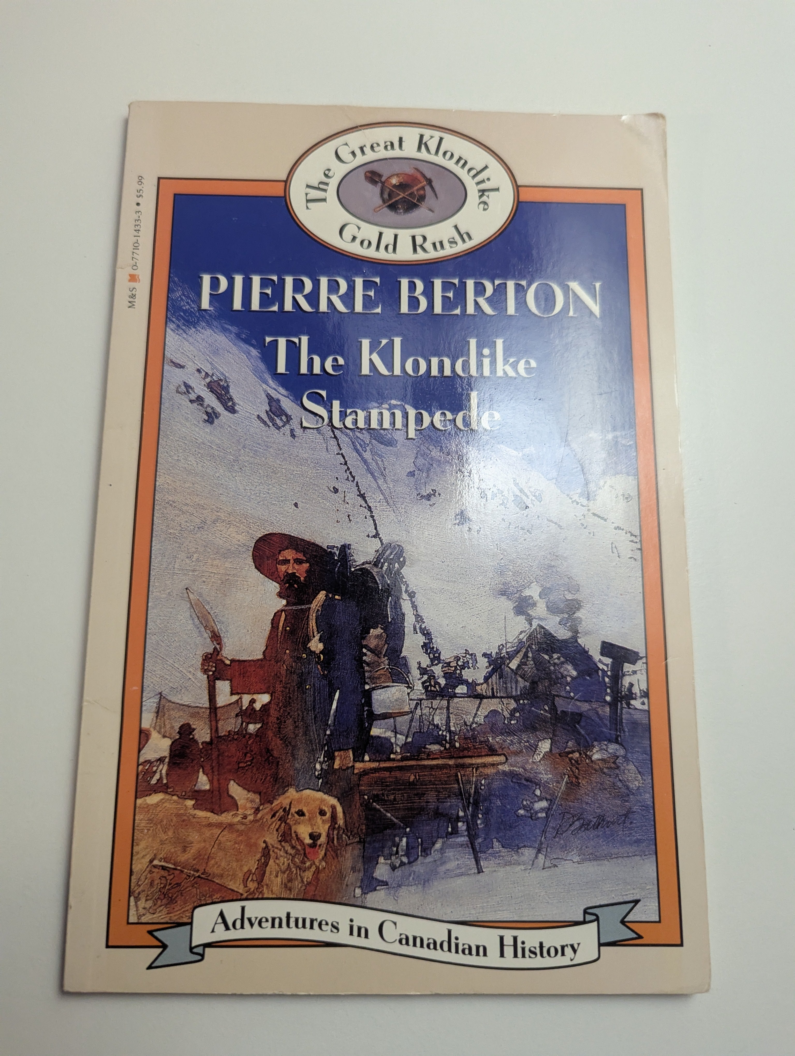 The Klondike Stampede — by Pierre Berton - Lightly Used