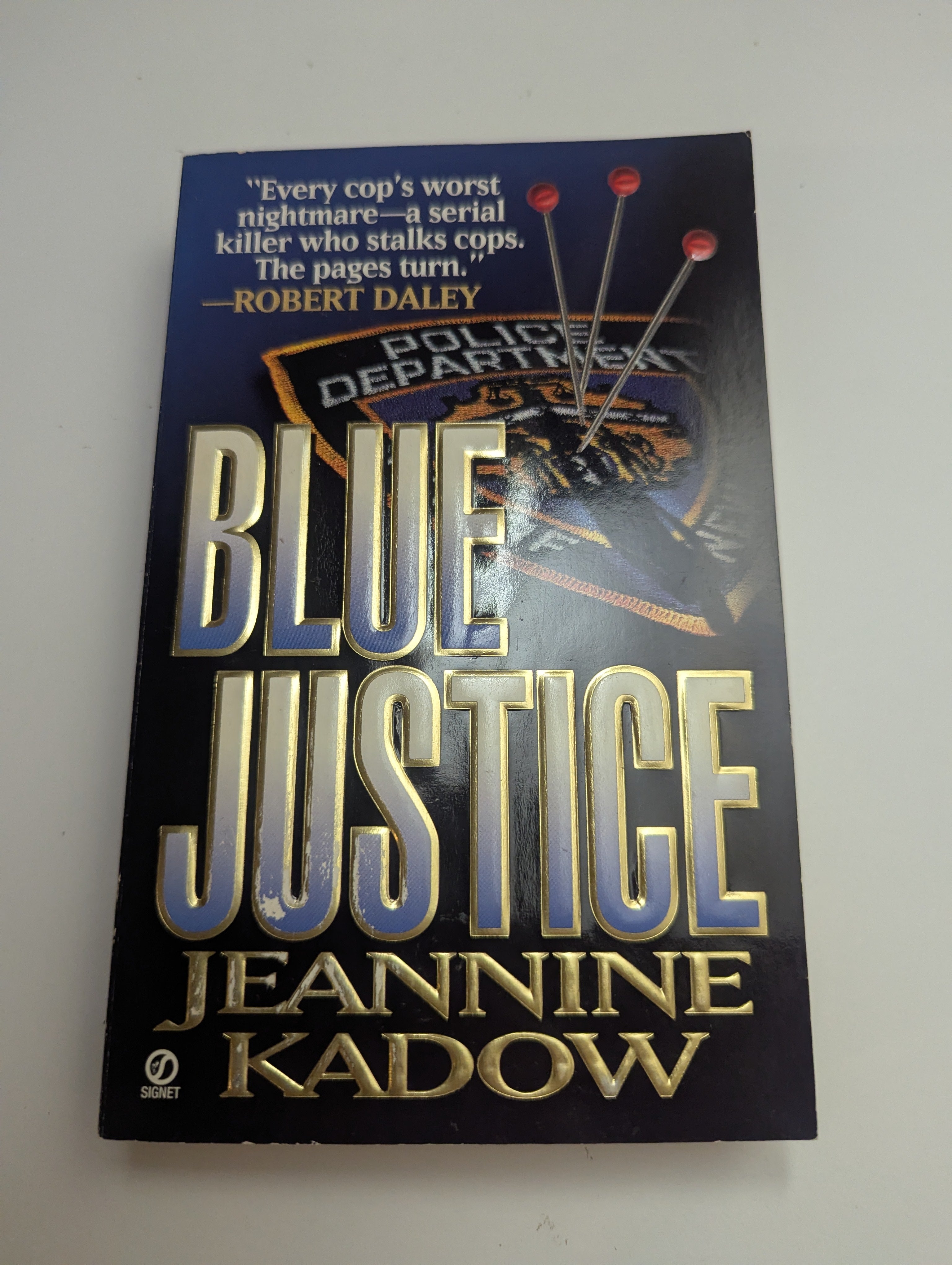 Blue Justice — by Jeannine Kadow