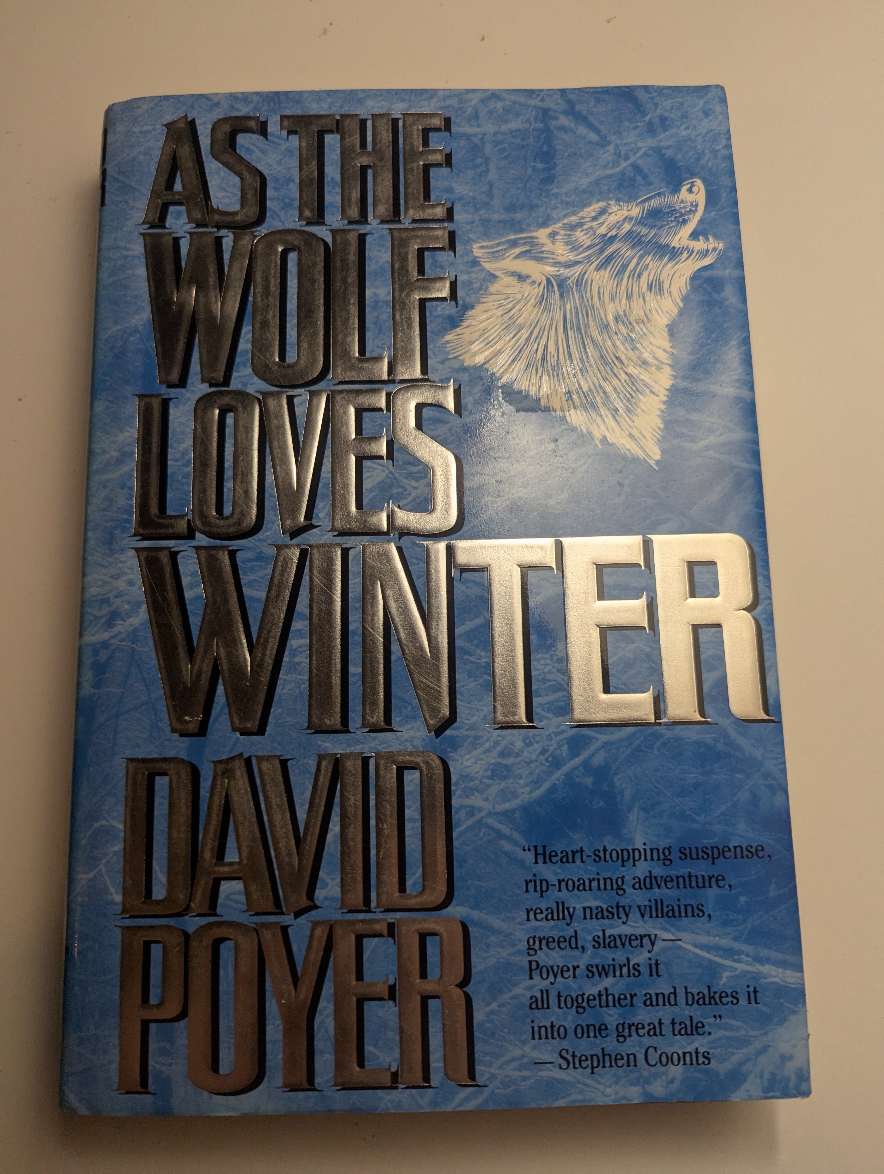 As the Wolf Loves Winter — by David Poyer - Lightly Used