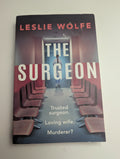 The Surgeon — by Leslie Wolfe - Lightly Used