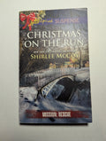 Christmas on the Run — by Shirlee McCoy - Lightly Used