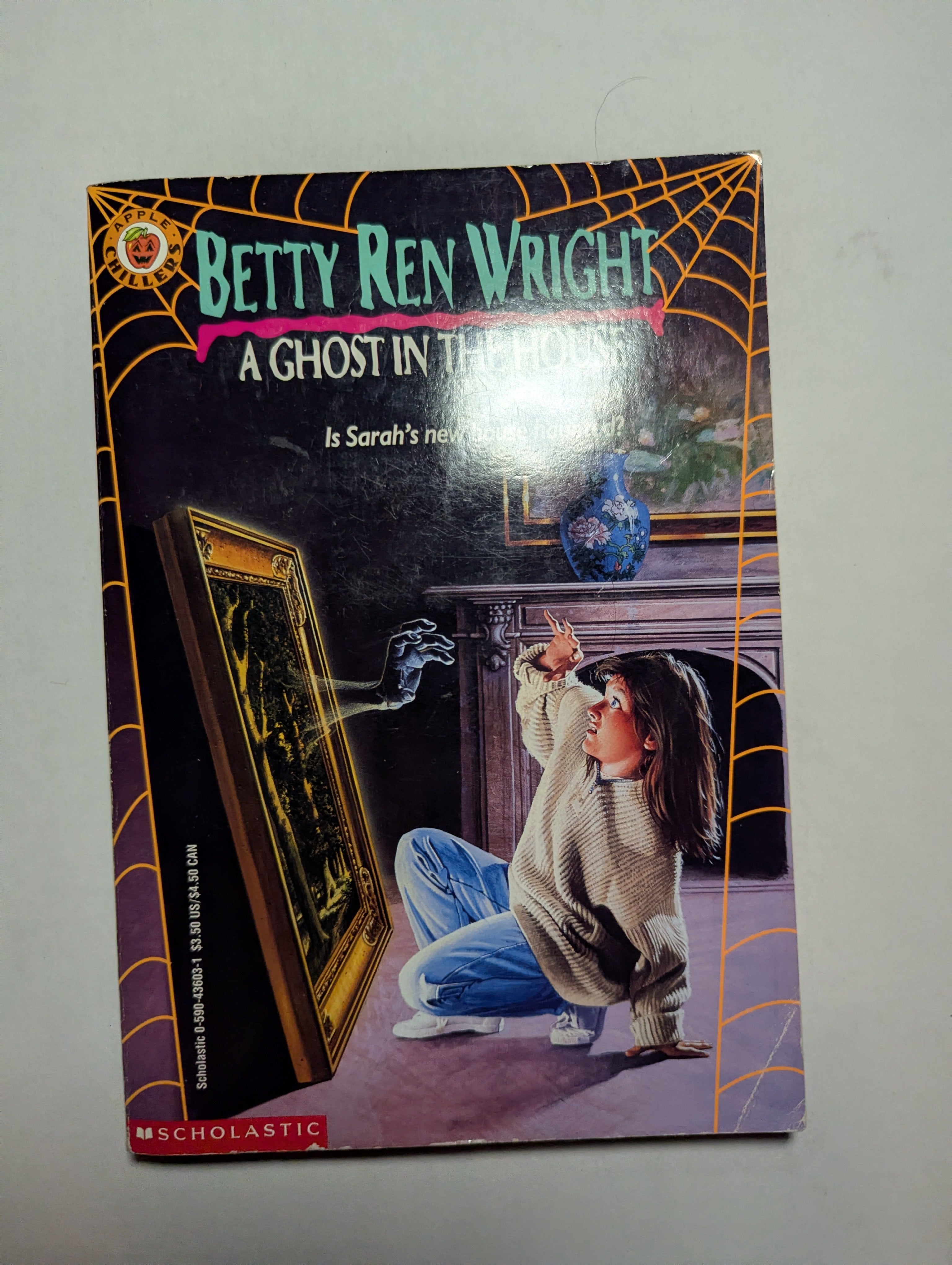 A Ghost in the House — by Betty Ren Wright - Lightly Used