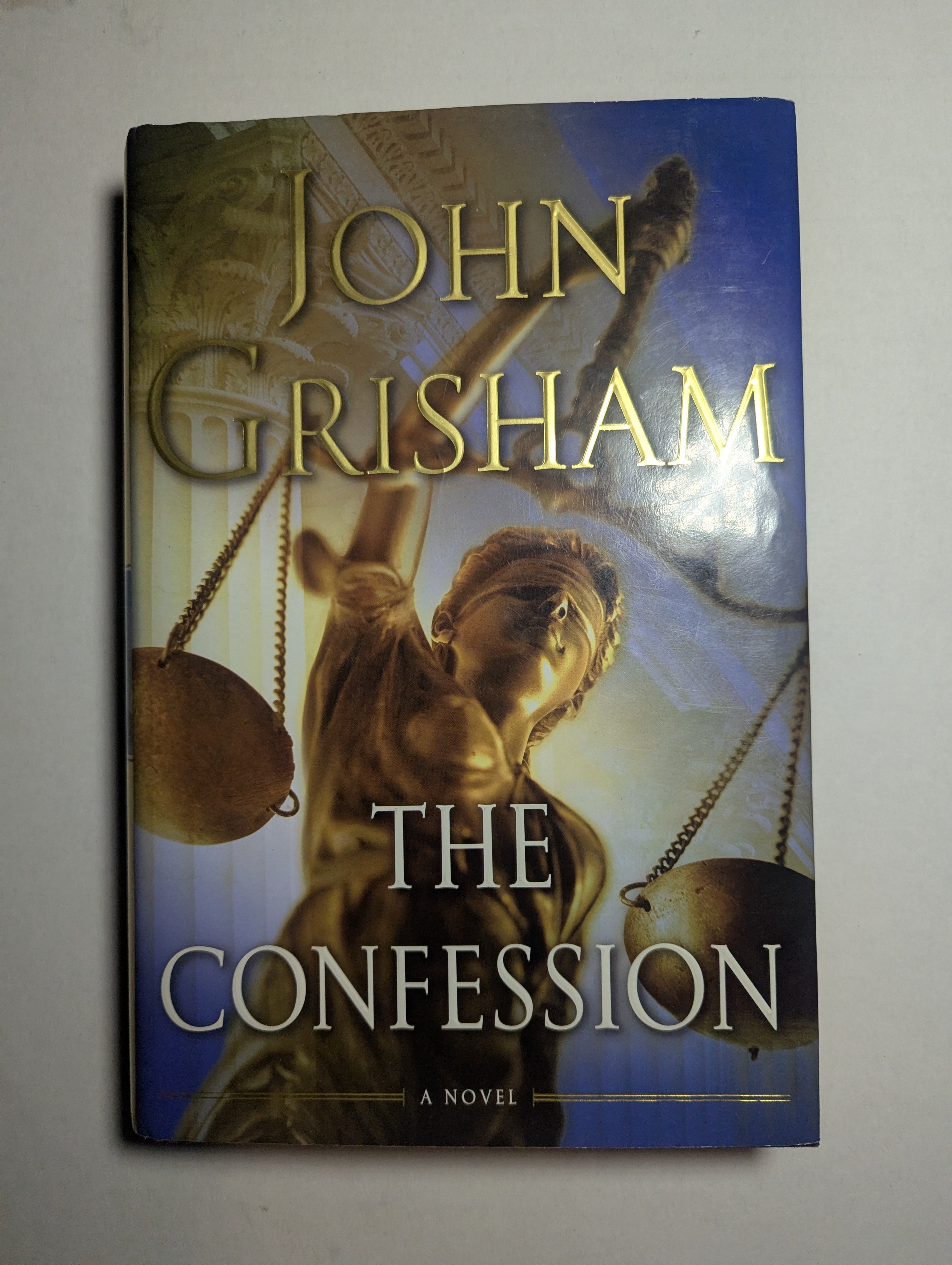 The Confession — by John Grisham - Lightly Used