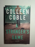 Stranger’s Game — by Colleen Coble - Lightly Used