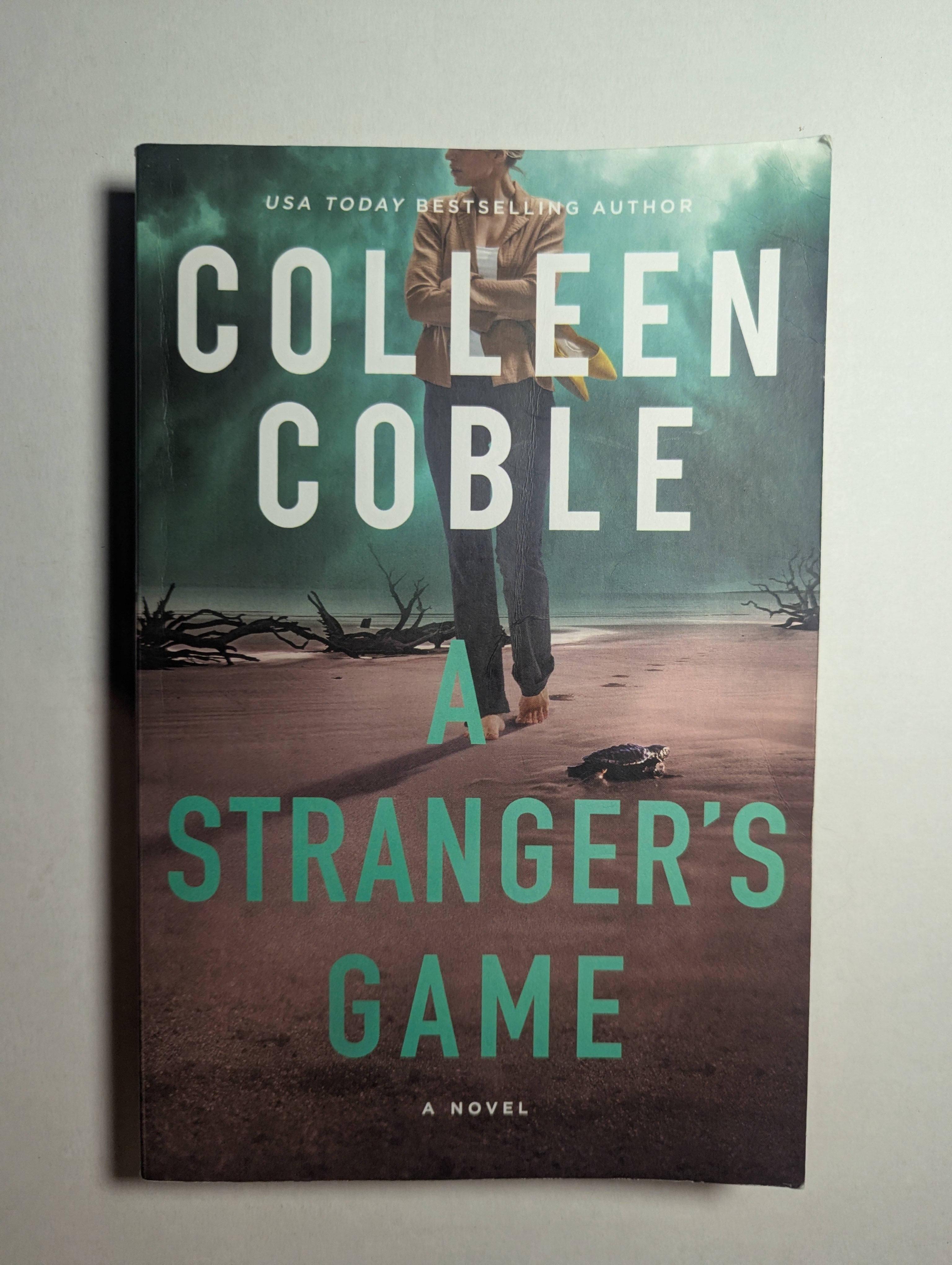 Stranger’s Game — by Colleen Coble - Lightly Used