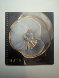Hats — by K. M. Kostyal - Lightly Used